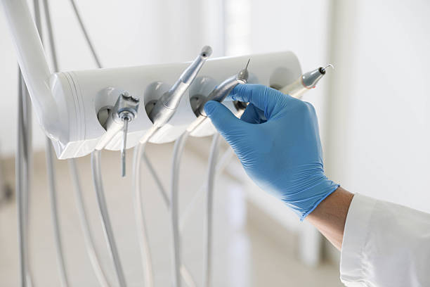 Professional Tooth Extraction technician working in DeRidder, LA